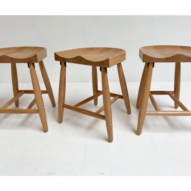 Charming set of 4 solid oak stools. The origins of the set are unclear, but that doesn’t make these organically shaped...