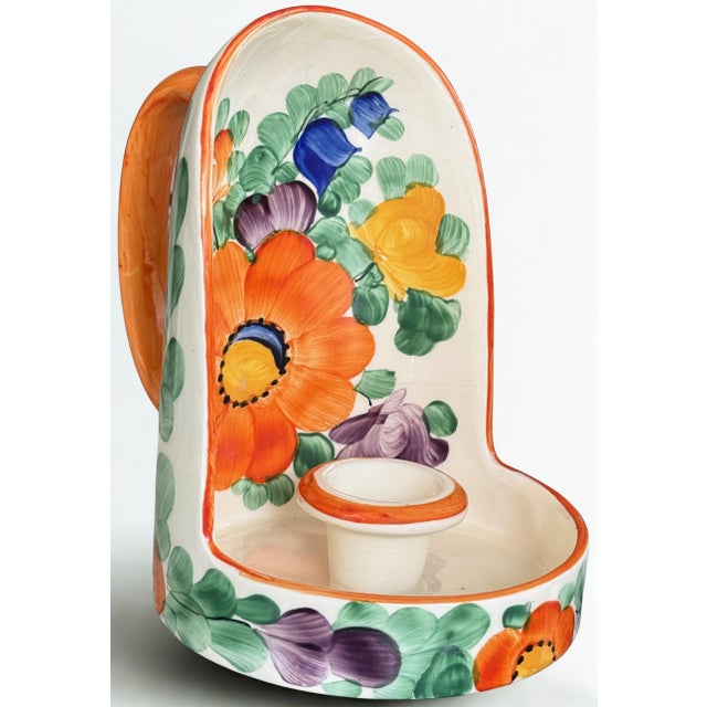 Hand-painted and glazed, Val's Dollhouse is proud to present this vibrant chamberstick from the Art Deco era, in the...