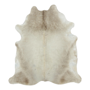 Rug & Kilim’s Contemporary Cowhide Rug in Warm Beige & Brown Tones
