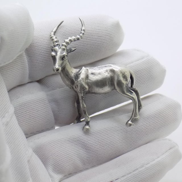 A striking vintage miniature depicting an ibex, handcrafted in Arezzo, Tuscany, Italy during the 1970s and 1980s in...