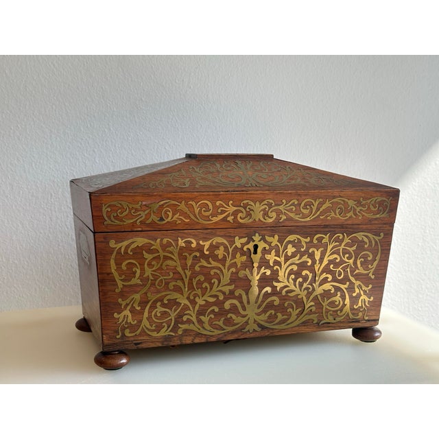 Mahogany Tea Caddy with beautiful brass boule detail on both interior and exterior. Removable copper caddy.