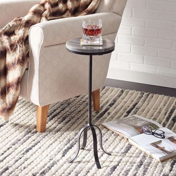 Sip in sophistication with this vogue Hiten Drink Table. A Victorian-style black metal base is stylishly updated with a...