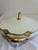 An elegant antique covered tureen by Haviland & Co. Limoges, featuring soft white porcelain with striking gold Art...
