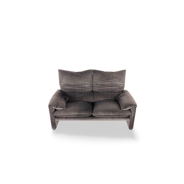 We are offering a beautiful gray Maralunga two-seater sofa in velvet/corduroy fabric by Cassina for sale. Designed by Vico...