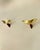 Pair of wall sconces composed of an exotic wood frame and a brass diffuser, produced by Arteluce in Italy in the 1980s and...