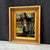 Elegant antique walnut wall mirror with warm wood grain accented by contrasting lemon gilt moldings and an aged gold...