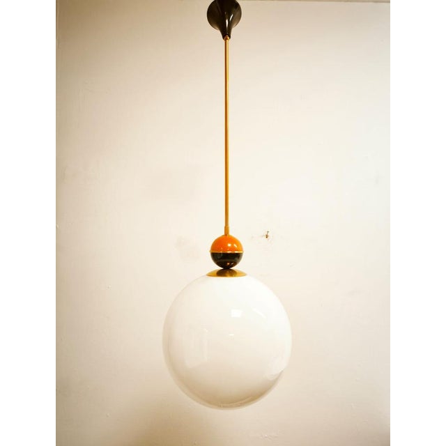Orange and Black Sphere Suspension, in Flawless conditions. Designed 1970 to 1979 Up to 250V (Europe/UK Standard).The...