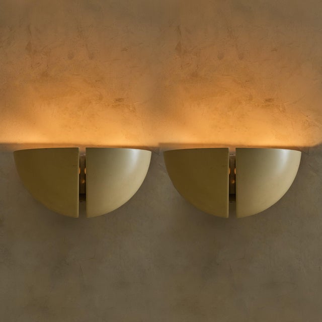 The ‘Oktavo’ wall sconce, model C-1542, designed by RAAK in the Netherlands during the 1970s, is a study in balance,...