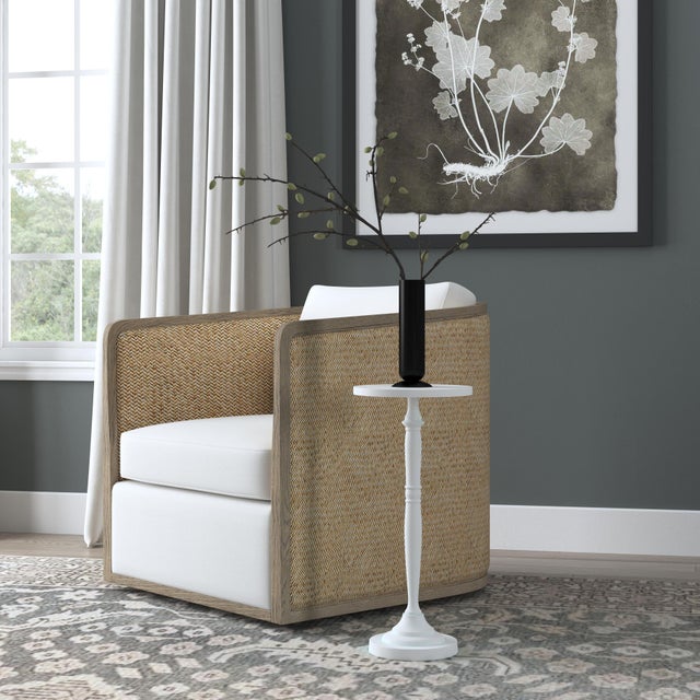 Elevate your outdoor space with the Butler Specialty Company Landon round pedestal end table. Expertly crafted from...