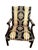 Pair of mahogany library chairs crafted in the Chippendale style with decorative carved arms and stretcher cutouts around...