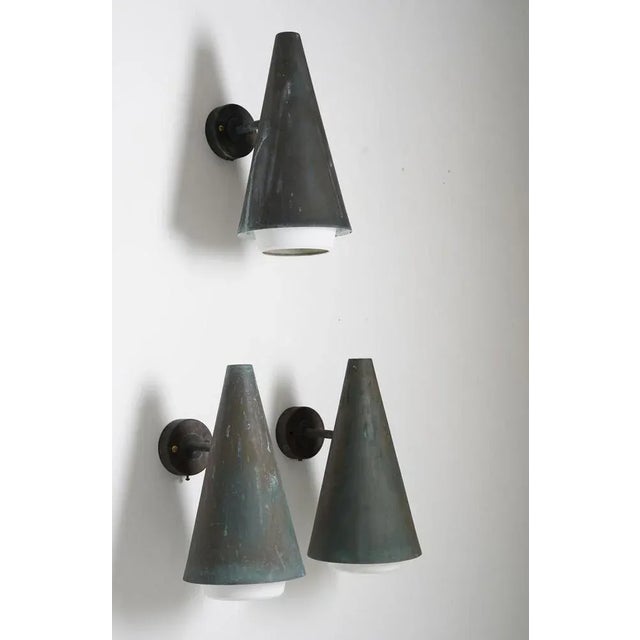 Very rare outdoor wall lamps by Hans-Agne Jakobsson, circa 1960. These lamps are made of solid copper with metal diffusers...