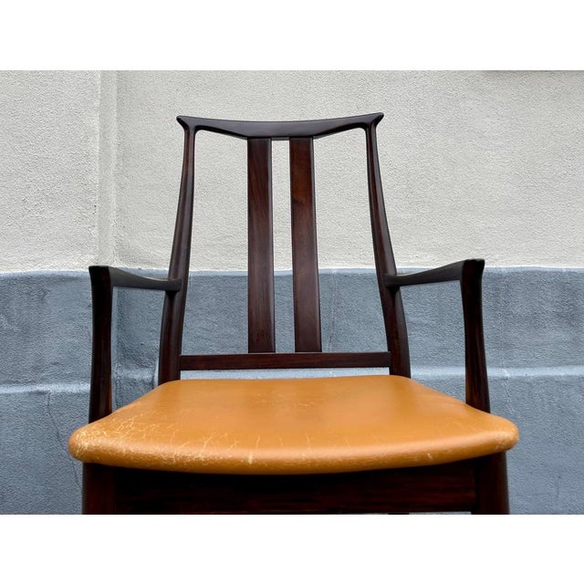 Stylish armchair made from philippine mahogany and tanned leather upholstery (original). Designed by dof - danish overseas...