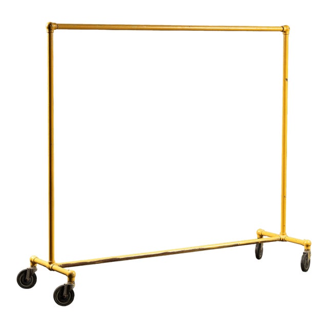 Vintage Industrial Pipe Rolling Garment Rack in Yellow For Sale
