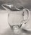 Very pretty Vintage Glass Pitcher with delicate handle. Perfect for batch cocktails or beverages.. It is plain glass and I...