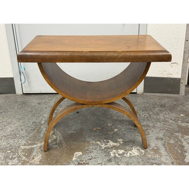 Design Plus Gallery presents a U-Shaped Coffee Table in Art Deco Styling. The attractive and unusual table has curved legs...