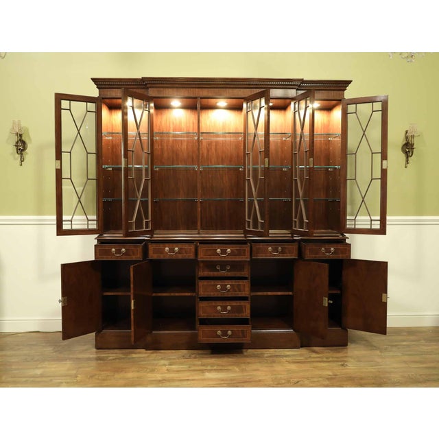 High-end five-door mahogany china cabinet offering excellent quality and functionality. It features a solid mahogany...