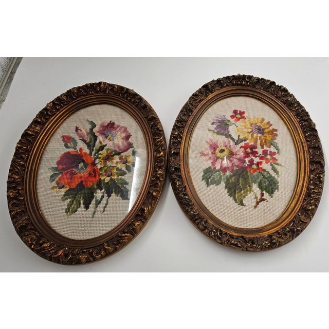 Pair of vintage needlepoint works in gilt oval frames ready to hang!. These beautiful pieces were acquired from an estate...