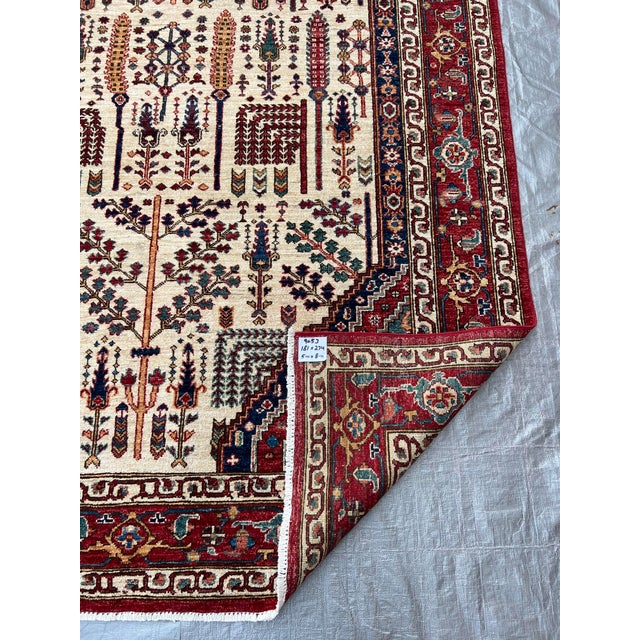 Hand‑Knotted Afghan Serapi Tree of Life Rug 5'11"×8'11" – Cream Field & Red Niche Floral Design For Sale - Image 11 of 12