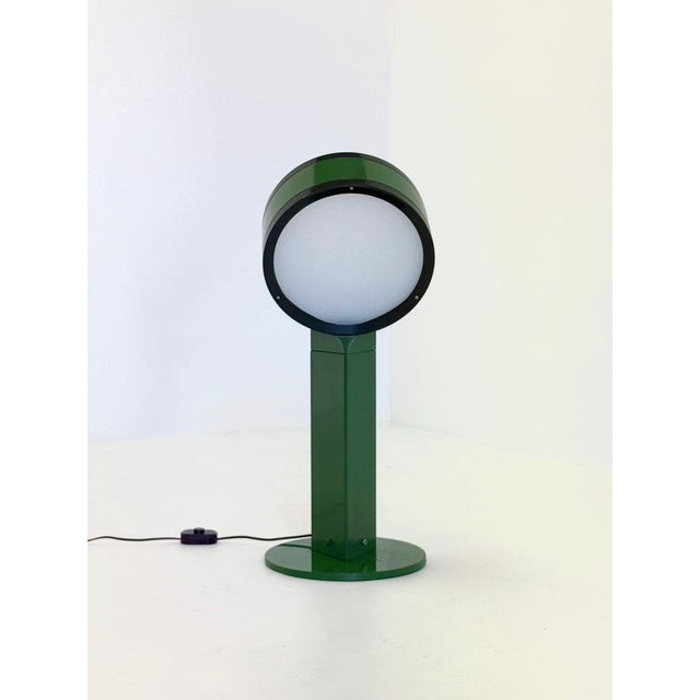The Tamburo lamp , designed by Afra & Tobia Scarpa for Flos in 1973 , is a beautiful example of their progressive design...