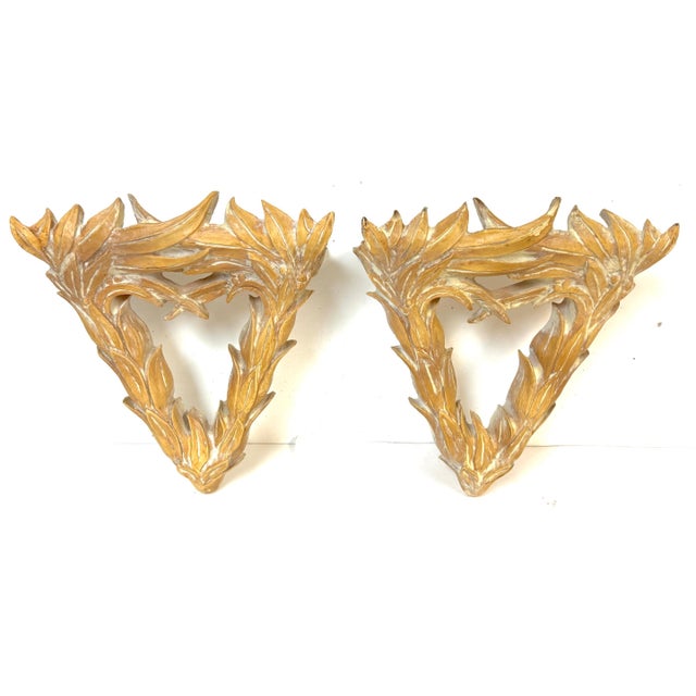 Pair of Serge Roche–Style Palmette Wall Brackets/Shelves France, mid-20th century Materials: Molded composition,...