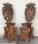 Pair of Flemish carved oak hall chairs, circa 1890. Profusely carved with heads, swags and foliage. Pair of antique Italy...