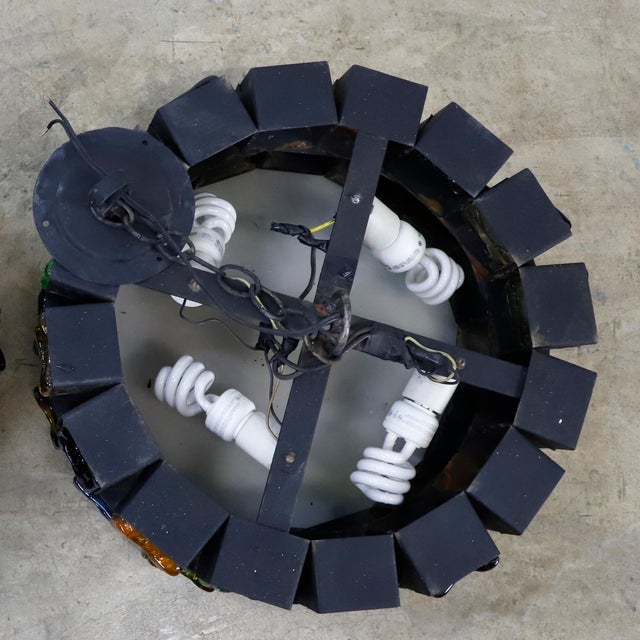 This chandelier is one of the most stunning samples of Brutalist art, made of steel and multicolored blown glass, each...