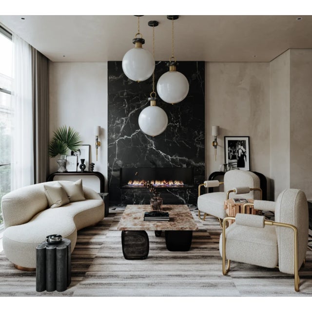 Hudson Valley 18 IN Glass, Marble and Brass Pendant Shade: 18" opal etched glass globe for soft, diffused light Accent:...