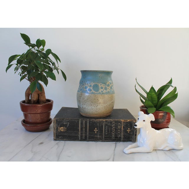 Vintage studio art drip glaze pottery vessel or vase. Makers mark on bottom. No chips or cracks.