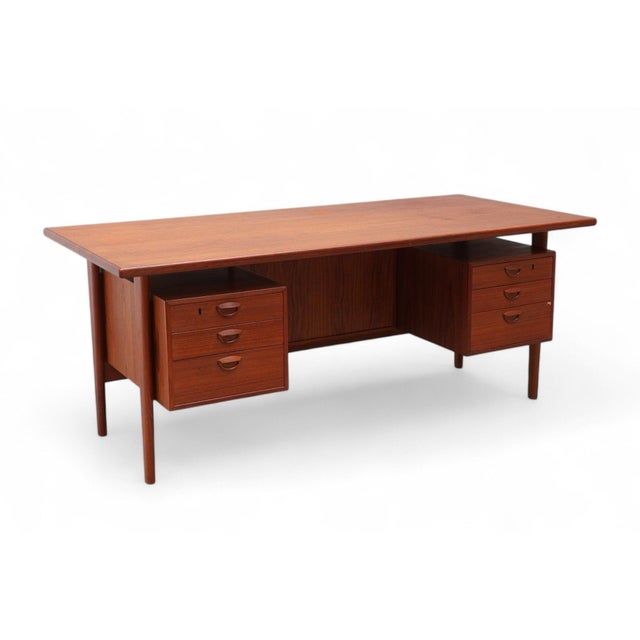 Origin: Denmark Designer: Kai Kristiansen Manufacturer: Feldballes Møbelfabrik Era: 1957 Materials: Teak Measurements: 71″...