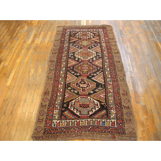Antique Persian Kuridsh rug, size: 3'8" x 7'5".