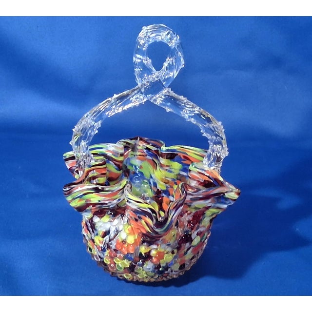 This Late Victorian early Art Nuevo Bohemian hand blown basket with loop thorn handle was made by the Franz Welz Art Glass...