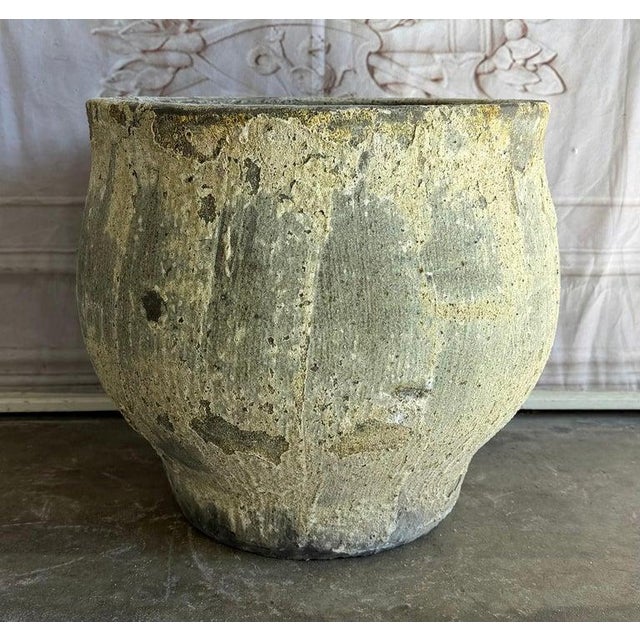 A captivating Mediterranean style low bowl planter, distinguished by its powerful rounded silhouette and an exceptionally...