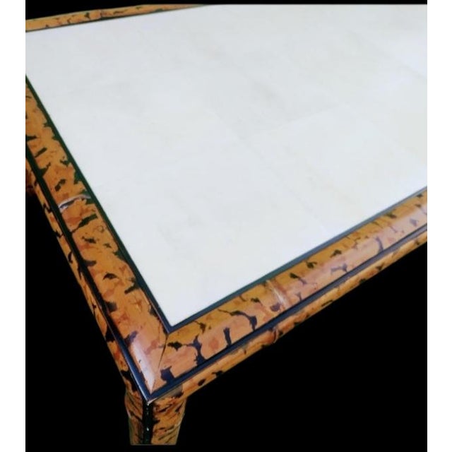 An incredible very large coffee table in the manner of Maitland Smith or Theodore Alexander. The table is unmarked,...
