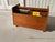 A vintage rolling magazine or record album rack, made of teak wood by Bruksbo. Made in Norway. Good vintage condition;...