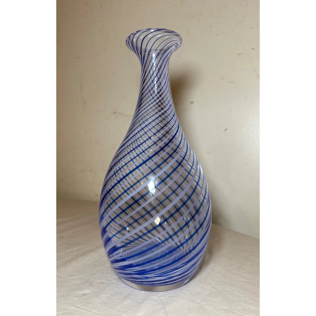 The Vintage 20th Century Turkish Pasabahce Blue Spiral Glass Vase is a unique and exquisite piece of art glass originating...