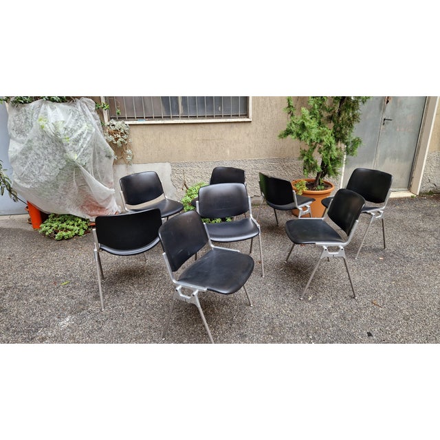 Chairs DSC Model in Black Eco-Leather by Giancarlo Piretti for Anonima Castalli, 1980s, Set of 8, in Very Good conditions....