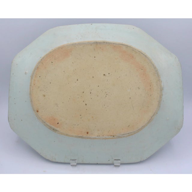 Circa 1800-30 large Blue Canton platter, Chinese export. Elongated octagonal form with incut corners. Pleasing decoration....