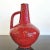 A tall (27 cm), deep red jug vase from CARSTEN's 'Atelier' series of the early to mid-1960s. The form is classic Heinz...