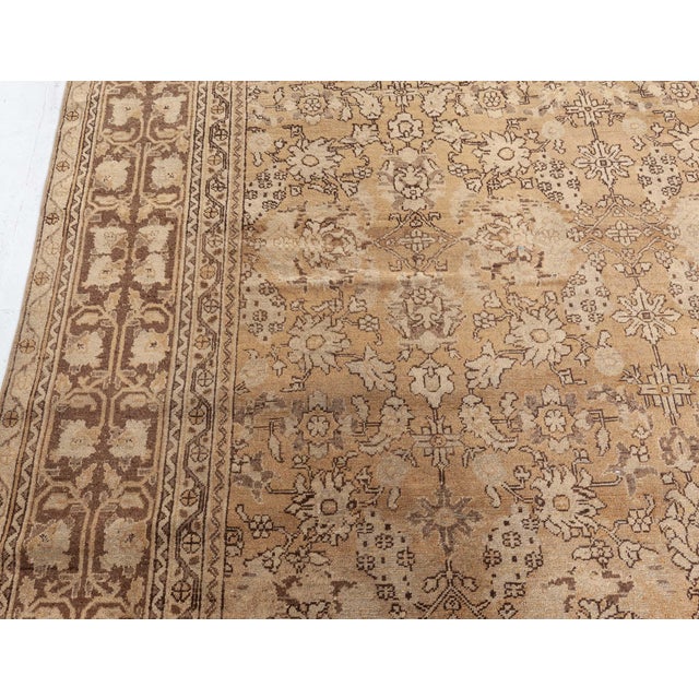 This exquisite antique Amritsar rug from the early 20th century reflects the rich textile tradition of Northern India with...