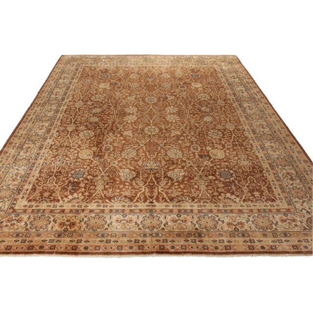 Hand knotted in wool, an exceptional antique 10x13 Samarkand rug originating from East Turkestan circa 1920-1930. Present...