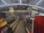 Dollar Tree by Brad Davis | Oil on wood panel Interior of a dollar store with checkout counters. For Sale