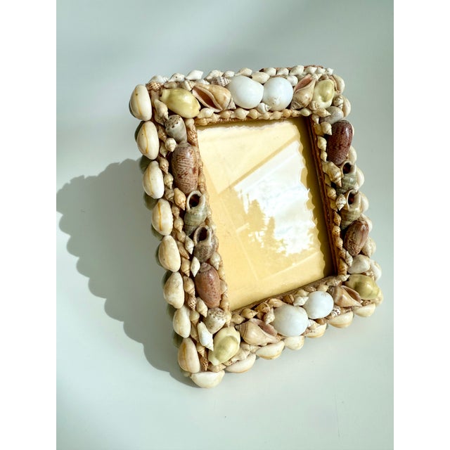 Unique, one-of-a-kind, MCM Vintage handmade shell picture frame on primitive hand hewn wood base. Exquisitely detailed...