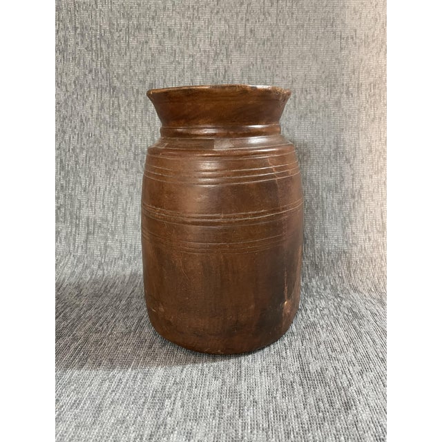 This seemingly simple wooden vase is a design object of infinite beauty and elegance that can be placed in either an...
