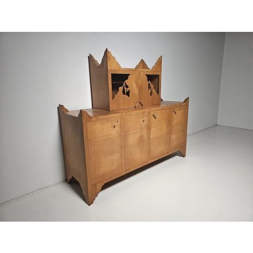 Ugo La Pietra, Breccia sideboard A sculptural 2-piece sideboard by Ugo La Pietra, titled “Breccia.” The cabinet rises like...