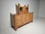 Ugo La Pietra, Breccia sideboard A sculptural 2-piece sideboard by Ugo La Pietra, titled “Breccia.” The cabinet rises like...