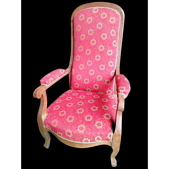 Pair of authentic Louis-Philippe armchairs, also known as Voltaire armchairs, with high backs offering unparalleled...