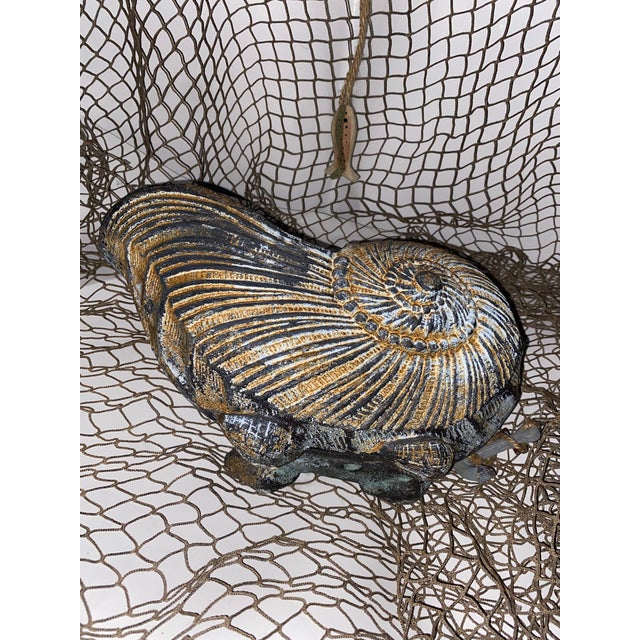 Heavy ! Minor wear for Age . Noted Drainage hole on planter Entire length 13” long Nautilus shells have long been admired...