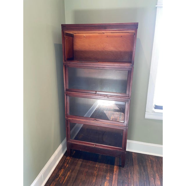 Antique Globe Wernicke four-stack barrister Bookcase in walnut--unique for this manufacturer. Likely manufactured in the...