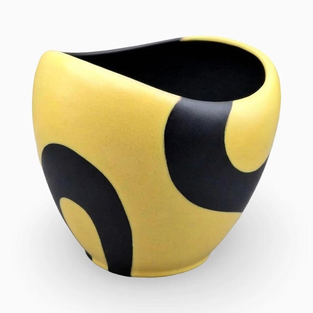 Classic mid-century ceramic by Van Daalen from the 1950s. The characteristic black and yellow decoration and striking...