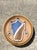This vintage round heraldic crest architectural element is a distinguished decorative plaque that reflects the enduring...